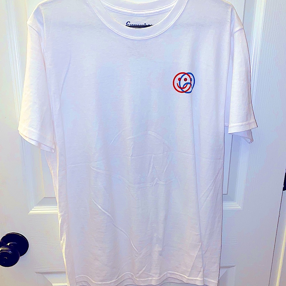 A white shirt with red and blue wording